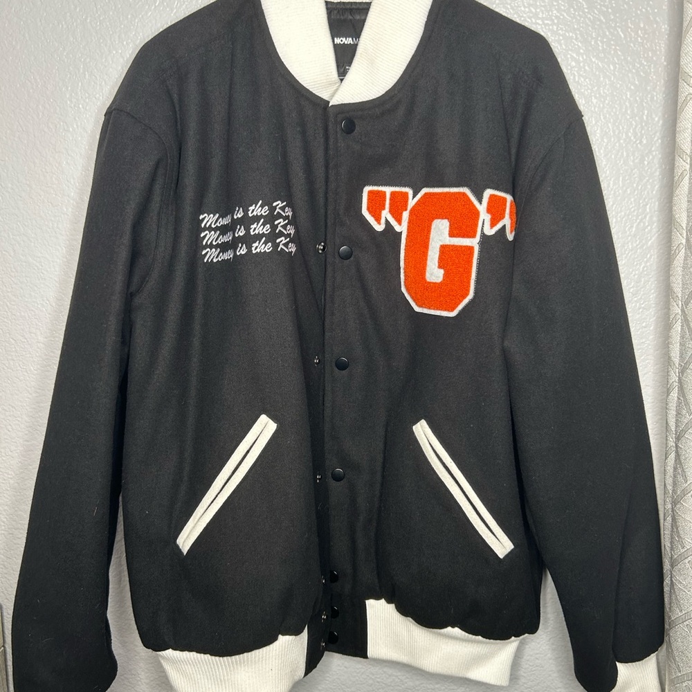 Black and White Varsity Jacket with Red Lettering